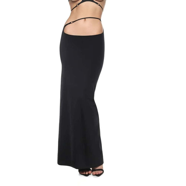Jupe longue en biflex fluide et extensible signée Anoeses, ornée d’anneaux métalliques et dotée d’une fente haute ajustable – création artisanale et sensuelle.