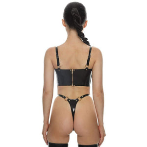 Femme De Dos Portant Un Ensemble String et Soutien-Gorge en Latex Naturel Noir