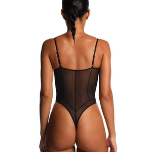 Body en tulle noir ANOESES porté par un modèle féminin allongé, découpes latérales, lacets décoratifs sur le buste, porté avec bas noirs et col assorti, esthétique fétiche haut de gamme Brigade Mondaine Paris.