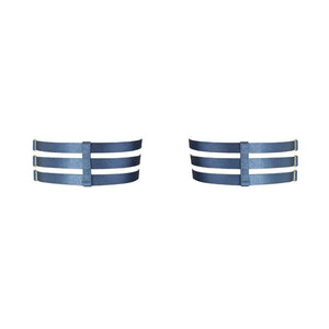 Accessoires modulables et structurants, ces Jarretières à lanières apportent une touche graphique à n’importe quelle silhouette.