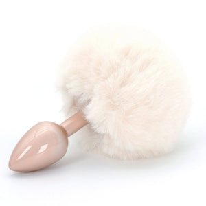 Plug anal Bunnytail rose avec queue en fausse fourrure douce, design raffiné et confortable.