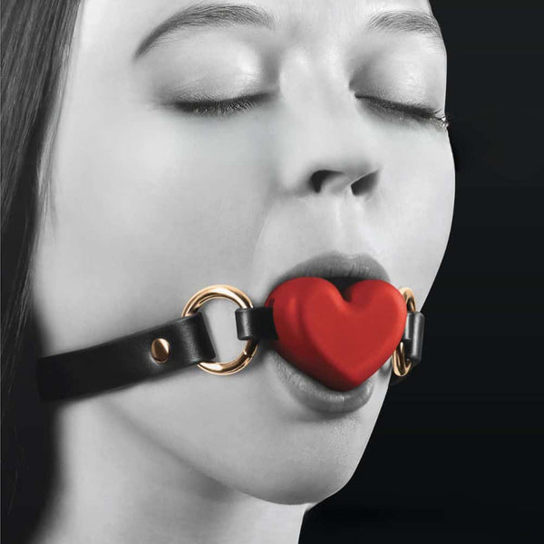 Gag bâillon Forme Coeur Rouge en Simili cuir Silicone et Métal sans nickel
