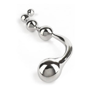 Wand Multi-Stim en acier inoxydable poli, forme incurvée avec extrémités sphériques, présenté sur fond blanc, sélection Brigade Mondaine Paris.