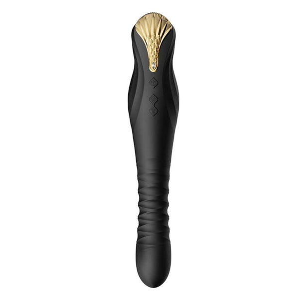 Stimulateur noir en silicone texturé avec finition dorée, présenté à la verticale sur fond sombre, proposé par Brigade Mondaine Paris.