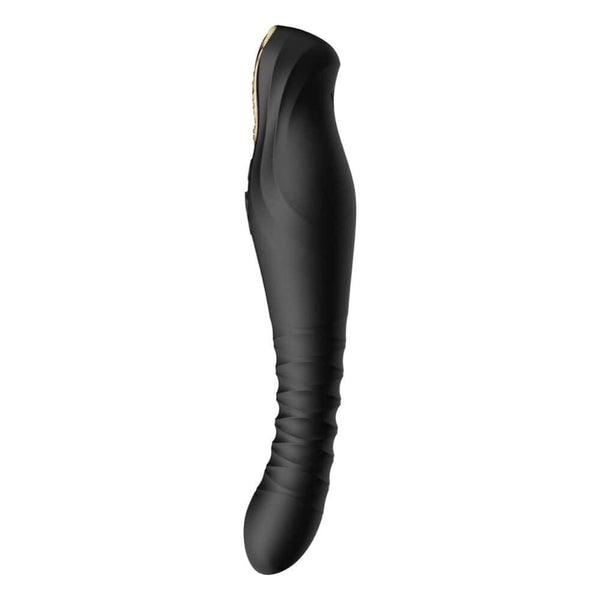 Stimulateur noir en silicone texturé avec finition dorée, présenté à la verticale sur fond sombre, proposé par Brigade Mondaine Paris.
