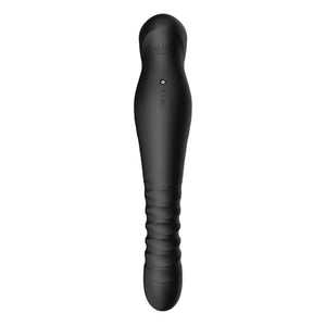 Stimulateur noir en silicone texturé avec finition dorée, présenté à la verticale sur fond sombre, proposé par Brigade Mondaine Paris.