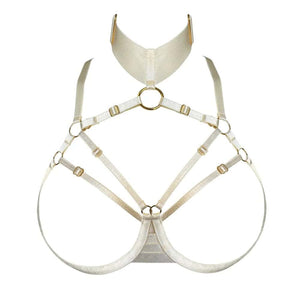 Harnais soutien-gorge ouvert crème BORDELLE Signature vu de face, sangles graphiques ajustables et anneaux dorés, présenté à plat sur fond clair.