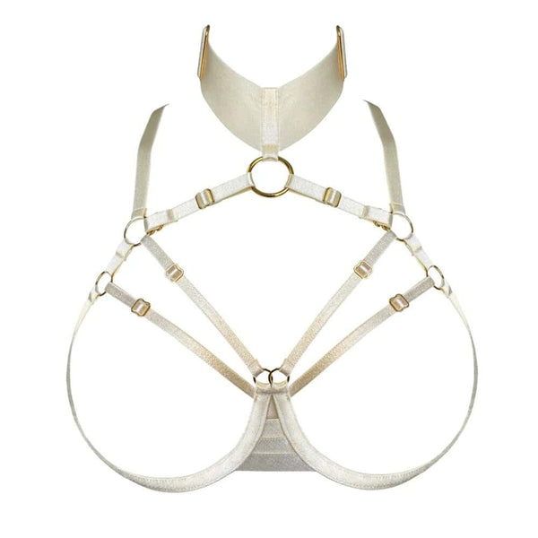 Harnais soutien-gorge ouvert crème BORDELLE Signature vu de face, sangles graphiques ajustables et anneaux dorés, présenté à plat sur fond clair.