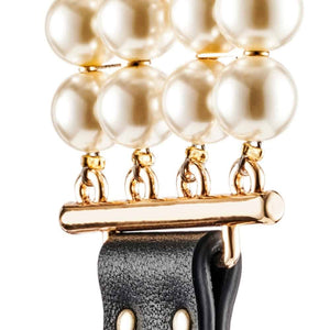 Laisse et collier en cuir noir avec perles et chaîne dorée, porté sur modèle, création élégante proposée par Brigade Mondaine Paris.