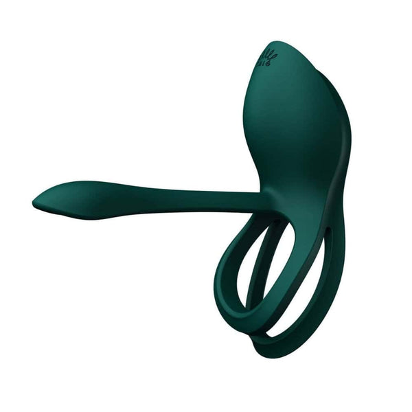 Vibromasseur portable au design ergonomique présenté avec son écrin, posé sur un décor aux nuances bleues et rouges, sélection Brigade Mondaine Paris. Sextoys Electriques