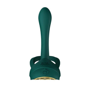 Vibromasseur portable au design ergonomique présenté avec son écrin, posé sur un décor aux nuances bleues et rouges, sélection Brigade Mondaine Paris. Sextoys Electriques