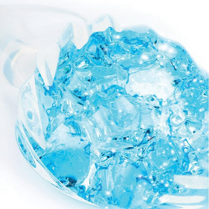 Plug en cristal translucide avec base évasée et texture interne brillante, accessoire proposé par Brigade Mondaine Paris.