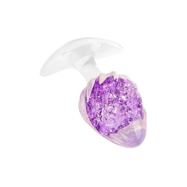 Plug en cristal translucide avec base évasée et texture interne brillante, accessoire proposé par Brigade Mondaine Paris.