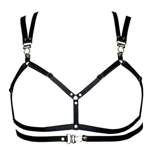 Le soutien-gorge LALITA noir offre une allure sensuelle avec son design ouvert à l'avant. Des fermetures porte-jarretelles viennent orner les bretelles et le devant, ajoutant une touche de sophistication audacieuse. Avec ses sangles ajustables, il assure à la fois un maintien parfait et un style unique, alliant sensualité et raffinement.