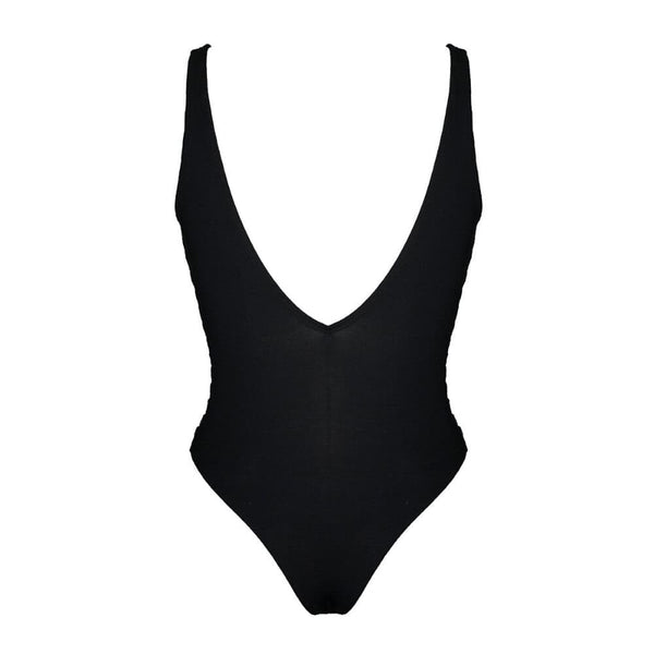 Le body en tissu noir, délicatement moulant, met en valeur les courbes féminines tout en offrant un design raffiné avec un dos plongeant. Cette pièce de lingerie à la fois élégante et audacieuse incarne la sensualité et le chic, pour une silhouette aussi séduisante que sophistiquée.