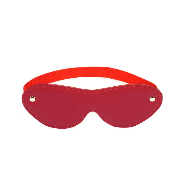 Bandeau Crimson Desire de la marque Liebe Seele, en cuir rouge avec sangle élastique assortie, présenté à plat sur fond clair dans l’univers Brigade Mondaine Paris.