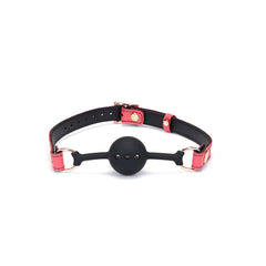 Packshot Collier GAG en Cuir Rose et Boule en Silicone Noir