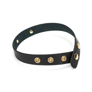 Collier en cuir noir LIEBE SEELE avec inscription Bitch en lettres dorées et boutons pression réglables, présenté sur fond blanc