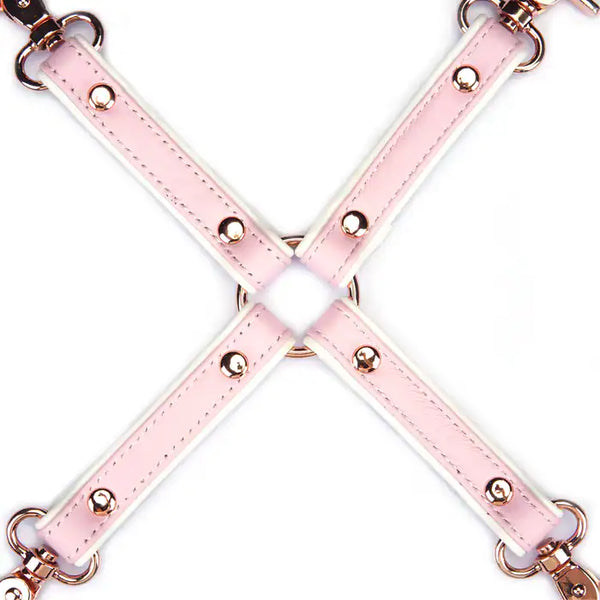 Hogtie en cuir rose et blanc de la collection Fairy, en cuir d'agneau avec clips métalliques or rose. Accessoire BDSM pour immobiliser totalement, alliant douceur et soumission dans un design pastel élégant.