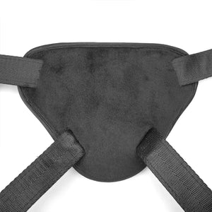 Harnais Strap-On Pink LIEBE SEELE avec base structurée rose, sangles noires réglables et anneaux métalliques, présenté à plat sur fond blanc, vue produit détaillée