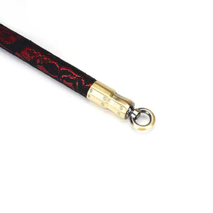 Barre d'écartement de 50 cm en Simili Cuir Rouge Recouverte de Dentelle Noire détails et attaches en métal doré