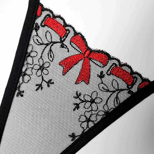 Mini string en tulle noir brodé avec fleurs délicates et nœud rouge central, modèle The Gift de Lucky Cheeks.