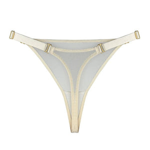 String BORDELLE Mesh Cream vu de trois-quarts, en tulle ivoire transparent avec ceinture elastique fine et finitions métalliques dorées, présenté chez Brigade Mondaine Paris.