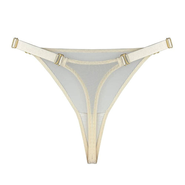 String BORDELLE Mesh Cream vu de trois-quarts, en tulle ivoire transparent avec ceinture elastique fine et finitions métalliques dorées, présenté chez Brigade Mondaine Paris.