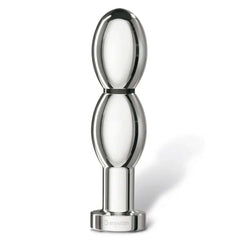 Plug électrostimulant OhThello en métal poli, design ergonomique et finition brillante, présenté sur fond clair, sélection Brigade Mondaine Paris.
