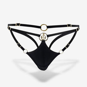 String QRUCIFIX noir à lanières fines avec anneaux métalliques dorés et design ouvert, présenté sur fond blanc par Brigade Mondaine Paris.
