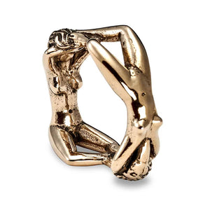 Accessoire bague anneau pour sexe masculin (phallus et bourses) composé de deux corps formant un cercle en bronze .