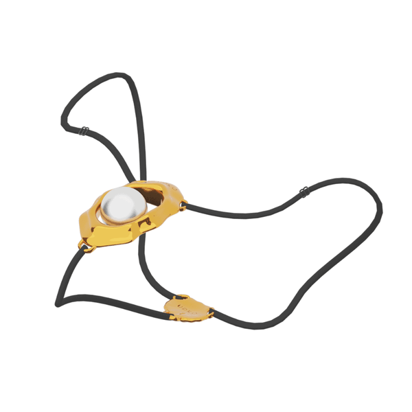 Bijou clitoridien “Moist Eyes” de UPKO avec stimulateur ergonomique et perle roulante. G-String ajustable, détails dorés, alliage de zinc hypoallergénique pour une stimulation et un confort optimaux.