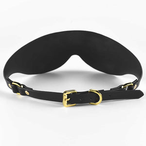 Masque cache-yeux tout en cuir noir et finition or UPKO chez Brigade Mondaine