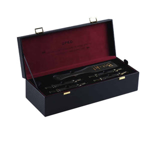 Malle d'accessoires bondage et BDSM en cuir noir et or 24K entièrement fait main et fond en velours UPKO chez Brigade Mondaine