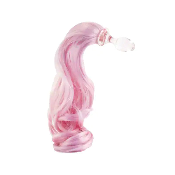 Photographie packshot de plug transparent avec queue de licorne rose sur fond blanc