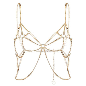 Harnais bijou de corps composé de deux harnais : un harnais ajustable de type soutien-gorge ouvert à poser sur le buste et d’une ceinture jupe à poser sur les hanches, habillant le corps d’une structure élégante et audacieuse. Design ajustable pour un confort optimal à porter seul ou en superposition