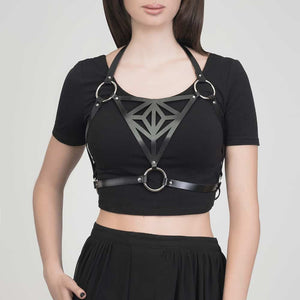 Harnais noir en cuir végétal avec des motifs triangulaires de Blasted Skin chez Brigade Mondaine
