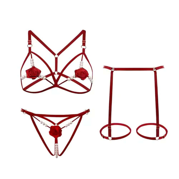 #rouge Set lingerie ouverte rouge composé d’un soutien-gorge ouvert, d’une culotte ouverte et d’un harnais avec perles synthétiques, confectionné en élastique, disponible en taille unique 34/40.