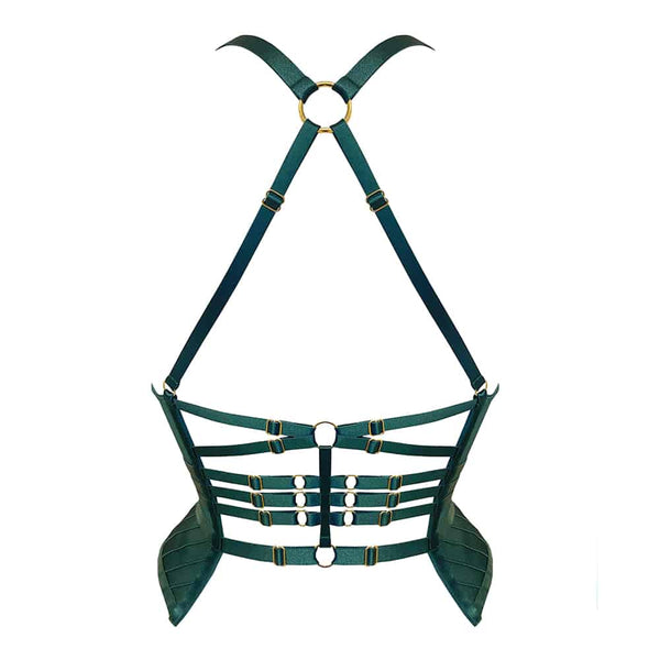Basque de la collection Kora chez Bordelle. Cette basque est de couleur vert eden. Elle est entièrement confectionnée à partir d’élastiques fins et verts. Elle s’attache sur le devant grâce à un zip dont la tirette est embossée du nom de la marque. La basque du produit laisse un espace vide au niveau du zip afin de laisser entrevoir la peau. Les bretelles sont fines et se posent sur les épaules. A l’arrière du produit, les bretelles sont jointes par un anneau placé quasiment au niveau de la nuque et continu