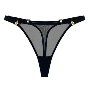String BORDELLE Signature Mesh porté de trois-quarts, en tulle transparent avec ceinture elastique fine et finitions métalliques dorées, disponible chez Brigade Mondaine Paris.