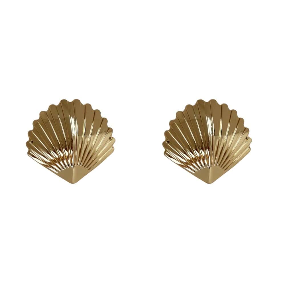Accessoire iconique de la collection Melusina, les Shell Gold Nipplets revisitent la pastie classique avec une touche bijou.