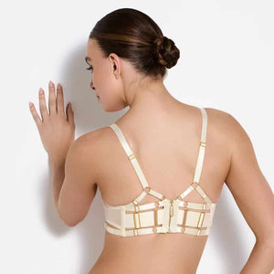 Vue de dos d’un soutien-gorge ivoire BORDELLE en tulle, mettant en valeur un dos travaillé en bandes elastiques réglables et une fermeture dorée centrale, sur fond blanc.