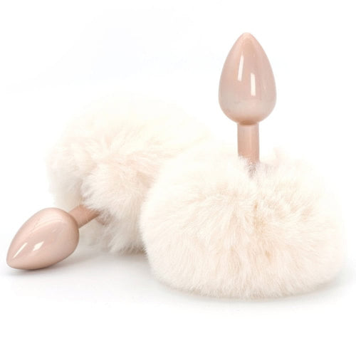 Plug anal Bunnytail rose avec queue en fausse fourrure douce, design raffiné et confortable.
