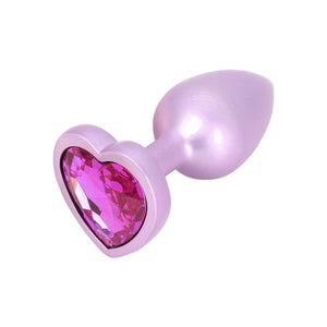 #rose Plug anal Time to Shine en aluminium mauve avec pierre violette scintillante en forme de cœur, design élégant et confortable.