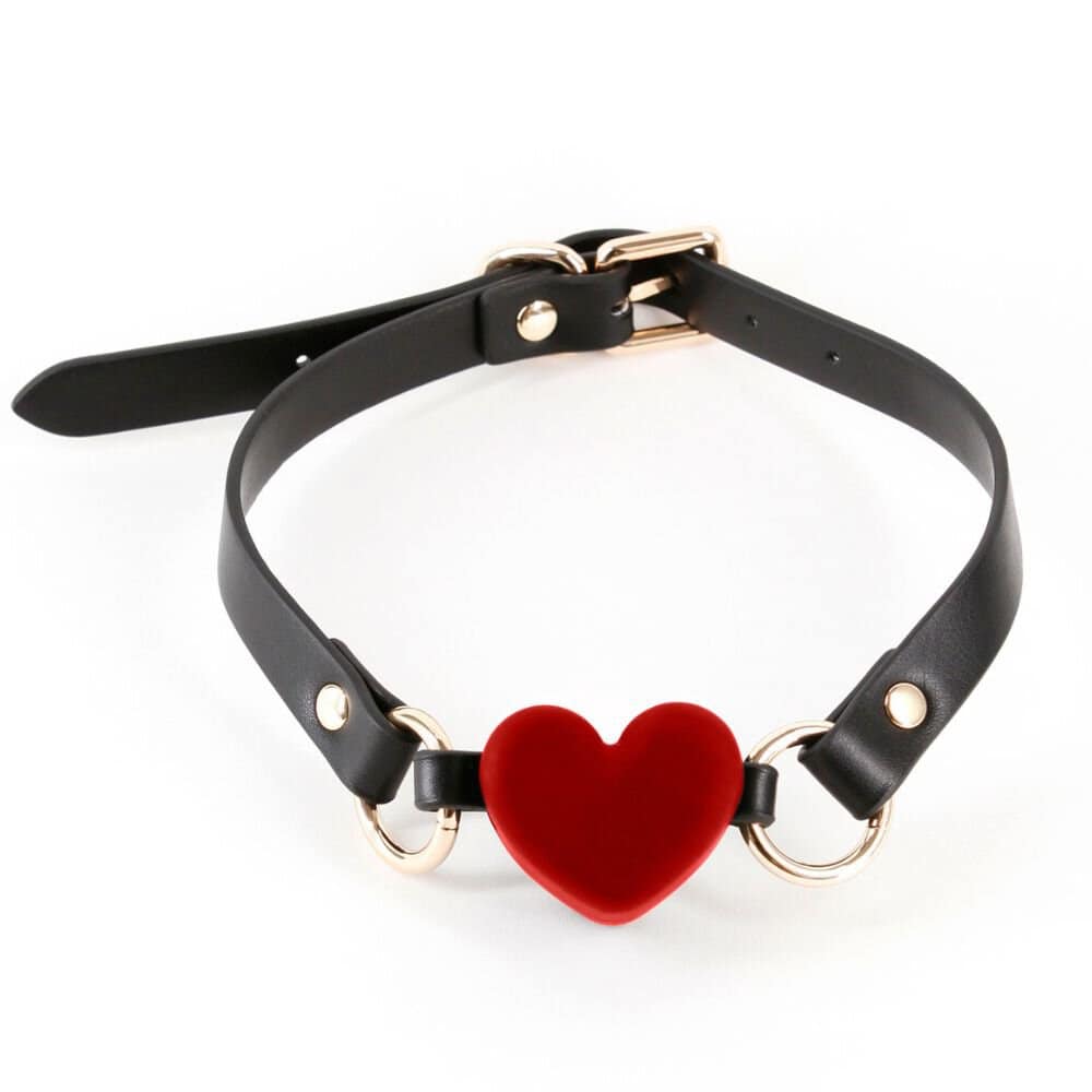Bâillon Gag Forme Coeur en Silicone Rouge en Simili cuir Détails en Métal sans nickel