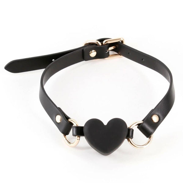 Bâillon Gag Forme Coeur en Silicone Noir en Simili cuir Détails en Métal sans nickel