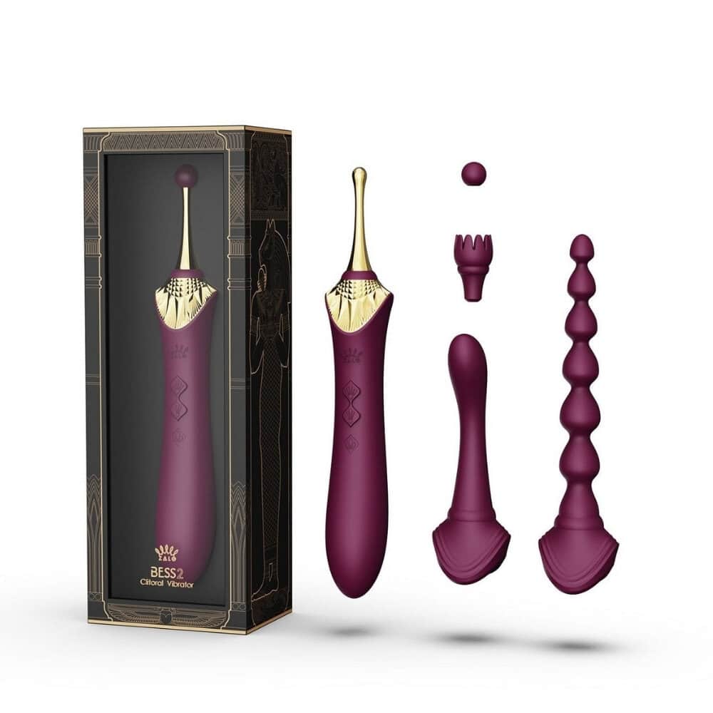 Stimulateur intime ZALO Bess 2, élégant et fin, en silicone haut de gamme, présenté avec embouts interchangeables et fonction chauffante, conçu pour une stimulation précise et personnalisée.