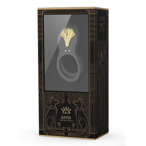 Vibromasseur portable au design ergonomique présenté avec son écrin, posé sur un décor aux nuances bleues et rouges, sélection Brigade Mondaine Paris. Sextoys Electriques