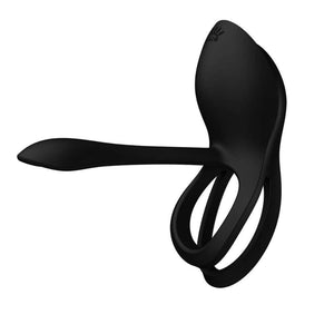 Vibromasseur portable au design ergonomique présenté avec son écrin, posé sur un décor aux nuances bleues et rouges, sélection Brigade Mondaine Paris.