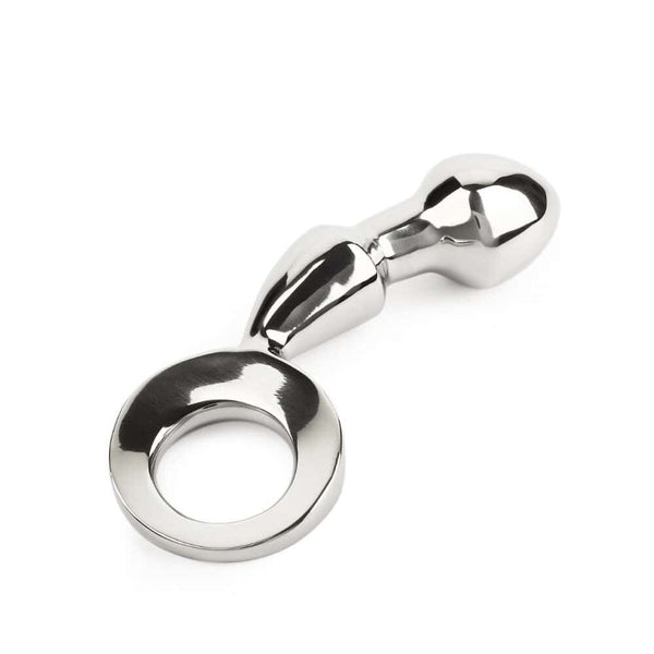 Plug anal DRANG en acier inoxydable poli avec base circulaire ergonomique, finition miroir, sélectionné par Brigade Mondaine Paris.